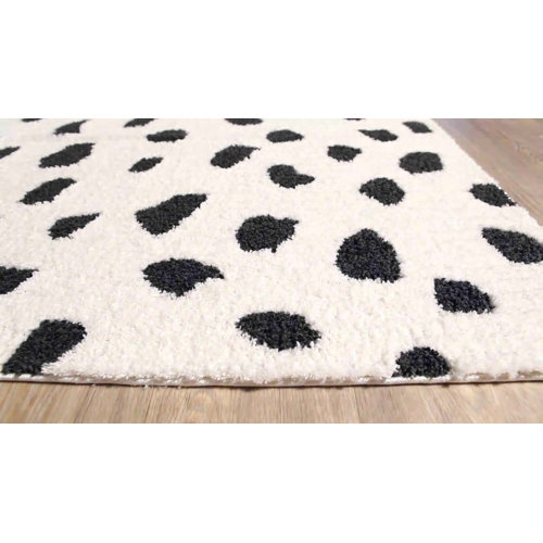 Hashtag Home Tommen Animal Print Area Rug in Neutral Black/White